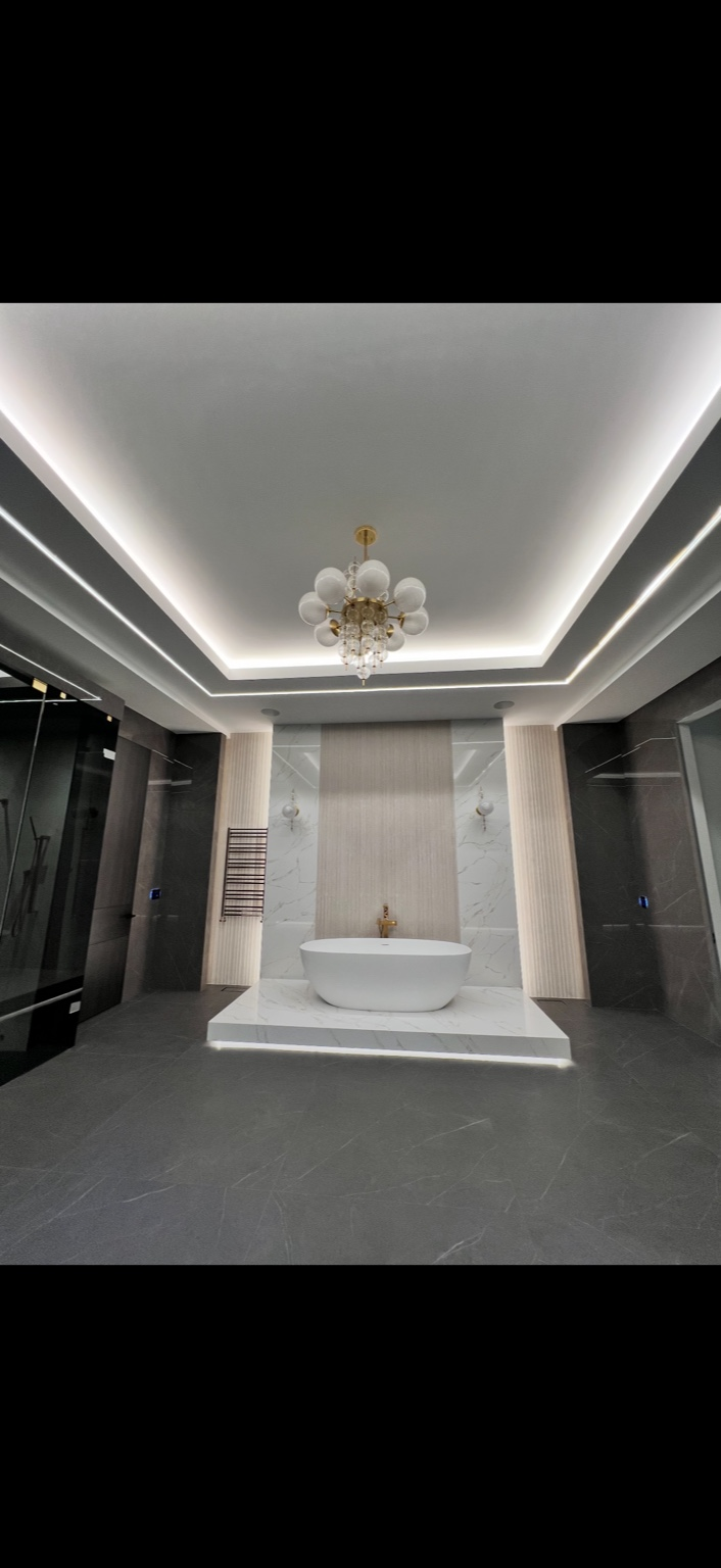 Luxury bathroom with cove lighting